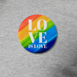 Love Pride Rainbow Ronde Button 5,7 Cm<br><div class="desc">Deze Pride Button is versierd met LOVE IS LOVE in vetgedrukte witte letters op een waterverf regenboogachtergrond van rood,  oranje,  geel,  groen,  blauw en paars. Oorspronkelijke Waterverf © Michele Davies.</div>