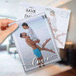 LOVE Script Wedding Photo Save the Date Aankondigingskaart<br><div class="desc">Modern photo wedding Save the Date postcards feature your photo with LOVE in chic white lettering on the front and your save the date and deliver to info on the back. Use the Customize further link and using our editing tools to make changes. Choose High-Definition printing option for better photo...</div>
