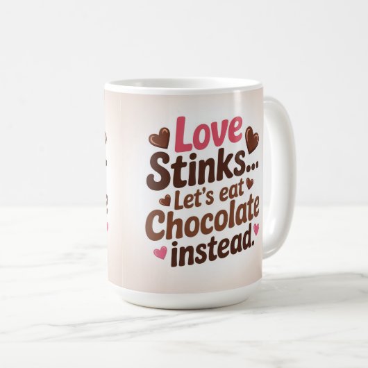 Love stinks let's eat chocolate instead koffiemok (Voorkant rechts)