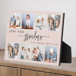 Love You Grandma 8 Photo Collage Blush Pink Fotoplaat<br><div class="desc">Give Grandma a gift she'll cherish. This photo collage plaque features eight of her favorite square photos of the grandkids, along with the message "Love You Grandma." The word "grandma" appears in elegant charcoal gray handwriting script with flourishes at the beginning and end on a blush pink background. Add the...</div>