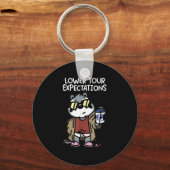 Lower Your Expectations Sleutelhanger (Voorkant)