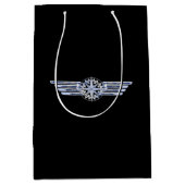 Lucht- en vliegenpakket als vleugellam op zwart medium cadeauzakje (Voorkant)