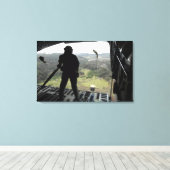 Luchtman kijkt naar een praktijkbundel herfst canvas afdruk (Insitu (Houten vloer))