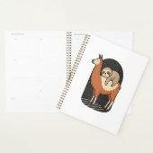 Luiaard rijdt op lama planner (Display)