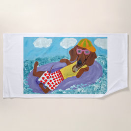 Luie Dachshund op een Vlot Strandlaken
