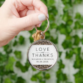 Luipaardafdrukken, spuiten, bruine luipaard, bruil sleutelhanger (Hand)