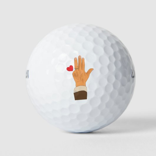 Lula's left hand and a heart golfballen (Voorkant)