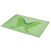 Luna moth op een bleke groene achtergrond snijplank (Hoek)