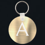 Luxe Gouden Nep Roestvrij Staal Monogram Sleutelhanger<br><div class="desc">Luxe Gouden Nep Roestvrijstalen Metallic Elegante Sleutelhanger. Deze sleutelhangers kunnen worden aangepast met uw initiaal en voornaam. Deze sleutelhangers zijn geweldige cadeaus voor verjaardagen,  bruidsfeesten of vrijgezellenfeesten.</div>