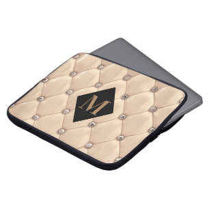 luxueuze tufed gold monogram laptop sleeve