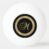 M gouden monogram op zwart pingpongbal (Voorkant)