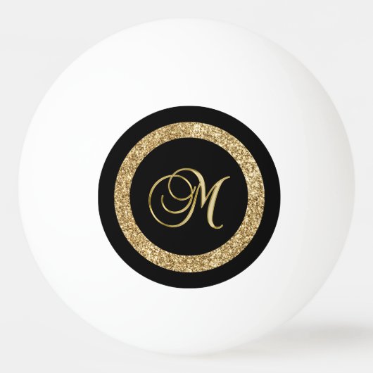 M gouden monogram op zwart pingpongbal (Voorkant)