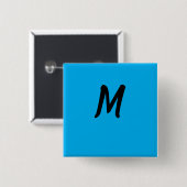 M op een blauwe vierkante button 5,1 cm (Voorkant /achterkant)