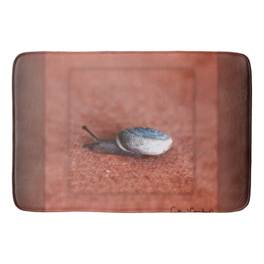 Macro-foto van slak op terracotta badmat (Voorkant)