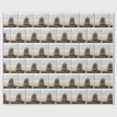 Madeliefje op een strandsteenmannetje met drijfhou cadeaupapier (Vlak)