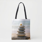 Madeliefje op een strandstenen cairn met drijfhout tote bag (Voorkant)