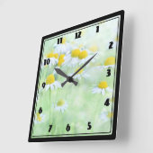 madeliefjes in een veldfoto op een vierkante klok (Hoek)