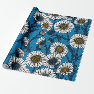 Madeliefjes op blauw cadeaupapier