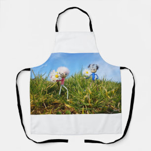 Madeliefjes plukkende fubby's.     schort