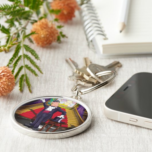 Magicus die goocheltruc uitvoert op het podium sleutelhanger (Zijkant)