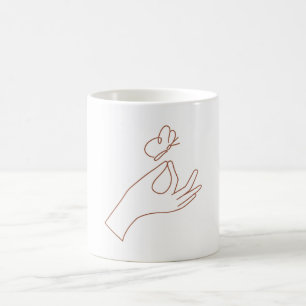 Magische handen met vlinder koffiemok