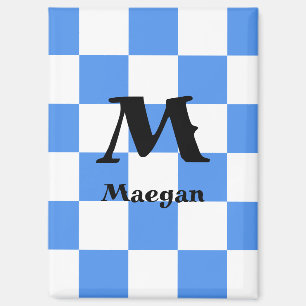 Magneet met blauwe geruite achtergrond