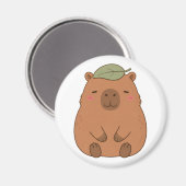 Magneet met knuffel Capybara met groen blad op hoo (Voorkant / Achterkant)