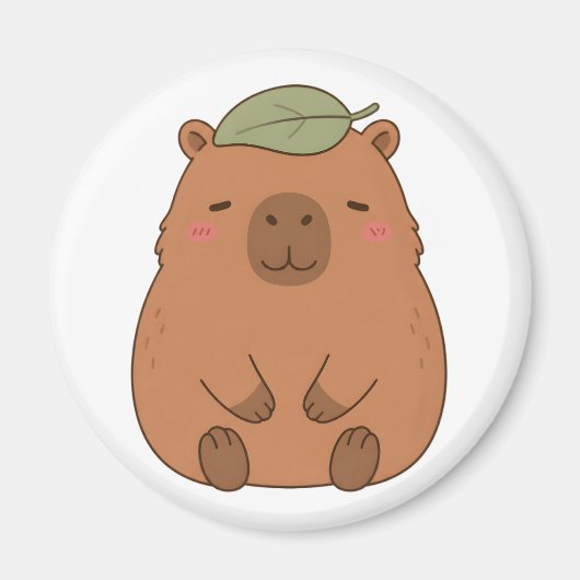 Magneet met knuffel Capybara met groen blad op hoo (Voorkant)