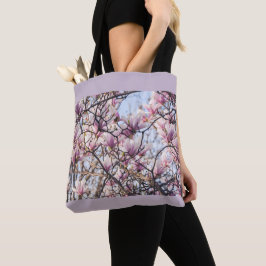 Magnolia blooming tree tote bag
