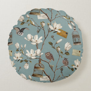 Magnoliabos met uilen in eendenei-blauw rond kussen