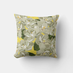 Magnolia's op geel kussen