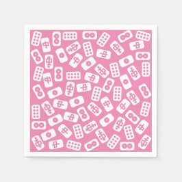 Mahjong tegels wit op baby roze servet