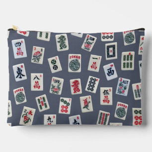 Mahjongsymbolen tegels op donkerblauw etui