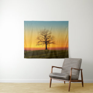 Majestueuze boom bij zonsondergang landschap wandkleed