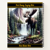 Majestueuze eland die staat bij een rustige waterv notitieboek (Achterkant)