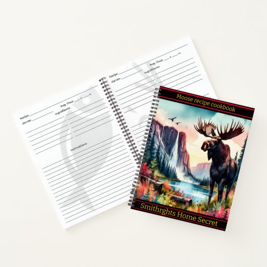 Majestueuze eland die staat bij een sereen bergmee notitieboek (Binnen)