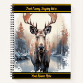 Majestueuze eland kijkt uit over rustig wintermeer notitieboek (Voorkant)