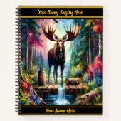 Majestueuze eland staat bij een serene bosstroom notitieboek (Voorkant)