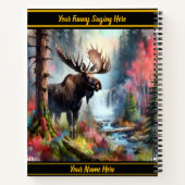 Majestueuze eland staat in de buurt van een levend notitieboek (Achterkant)