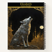 Majestueuze wolf huilt onder een stralende volle m notitieboek (Achterkant)