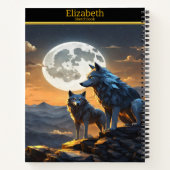 Majestueuze wolven huilen onder een heldere volle  notitieboek (Achterkant)