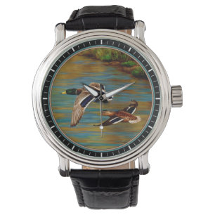 Mallard Ducks vliegen over de hond Horloge