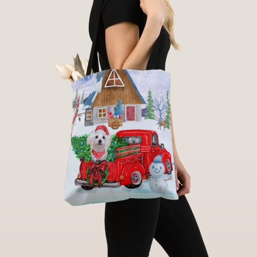 Maltese hond in kerstcadeauwagen tote bag