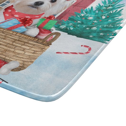 Maltese hond op sneeuwkerstmis snijplank (Hoek)