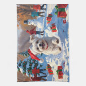 Maltezer hond rent in de sneeuw met kerstmuts theedoek (Verticaal)