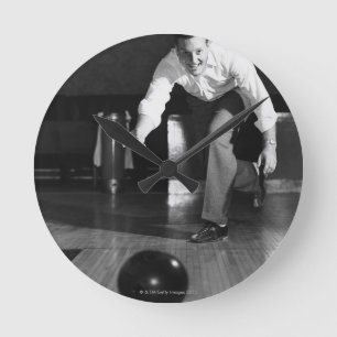 Man Bowling Ronde Klok