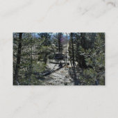 Man dat op een log in een bos zit visitekaartje (Achterkant)