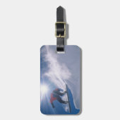 Man dat van een groot hoorntje springt op een snow bagagelabel (Voorkant verticaal)