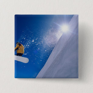 Man die door de lucht vliegt op een snowboard met vierkante button 5,1 cm