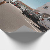 Man die skateboard speelt cadeaupapier (Hoek)